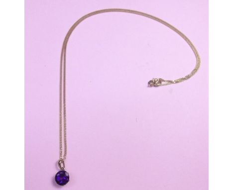 A 9 carat gold set amethyst pendant and chain