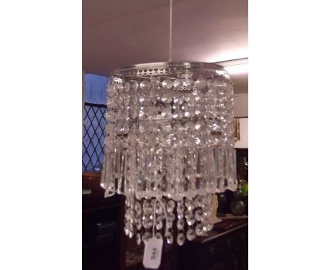 A pair of glass and silvered chandelier light fittings and gilt metal one