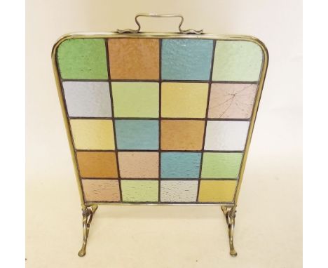 An Arts and Crafts style coloured and lead-glazed firescreen - one glass a/f