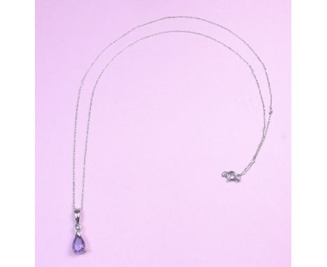 A 9 carat white gold pendant set amethyst
