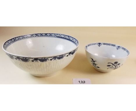 An 18th century blue and white Caughley tea bowl decorated stork and flowers (rim chip), and an 18th century blue and white r