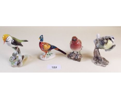 Four various bird ornaments including Beswick, Hummel etc