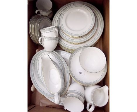 A Royal Doulton Berkshire dinner service comprising: one meat plate, nine dinner plates, six medium plates, six small plates,