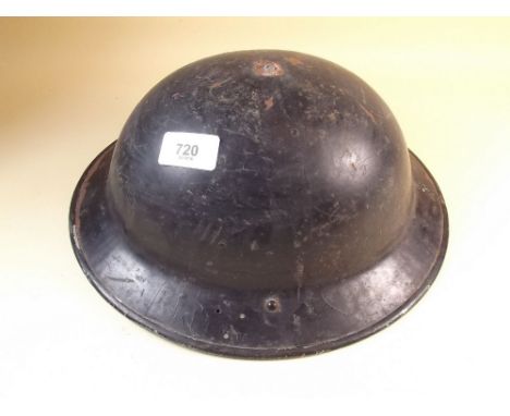 A WWII tin firemans helmet - re-painted