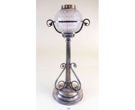 A Victorian silver plated oil lamp with cut glass reservoir