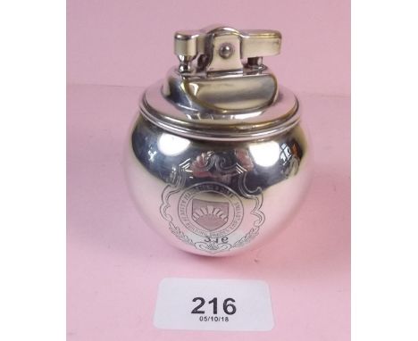 A silver 'Witchball' table lighter