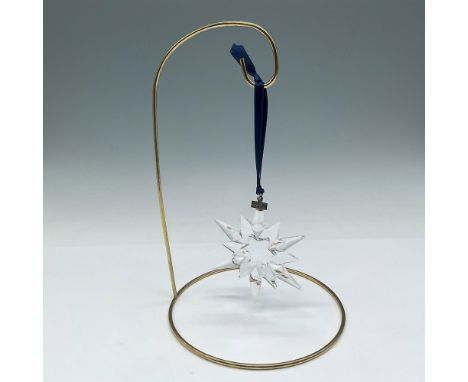 Lovely clear crystal ornament with engraved date tag and blue satin ribbon. Swarovski mark. This item has its original box 6"