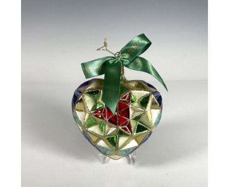 Handcrafted ornament with a stained glass design that forms a beautiful heart, featuring a geometric pattern with vibrant col
