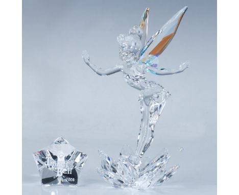Part of limited Disney series, this Tinkerbell figurine is crafted from clear crystal with aurora borealis wings. It includes
