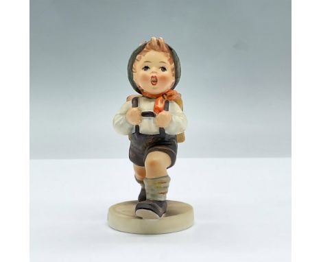 Features a boy dressed in a traditional German lederhosen carrying a backpack. School Boy 822/0. This item comes with a Goebe