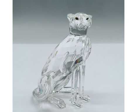 This sleek crystal Cheeta is sitting tall. It was a member of the African Wildlife group. This item has its original box meas