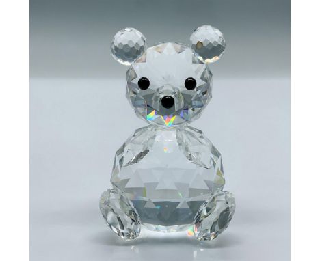As a part of the Woodland Friends collection, this crystal bear has black eyes and a black nose. This item has its original b