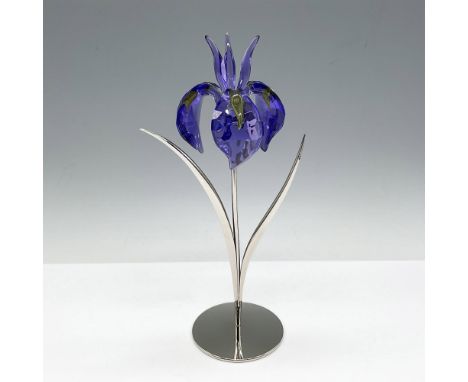 Stunning blue violet petals with segments of yellow. Beautifully joined to a rhodium metal stem and leaf. Swarovski impressed