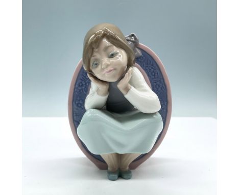 Adorable little girl with the letter O. Glossy porcelain. Lladro backstamp. This item has its original box, dimensions: 7.5''