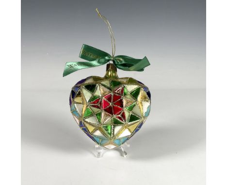 Handcrafted ornament with a stained glass design that forms a beautiful heart, featuring a geometric pattern with vibrant col