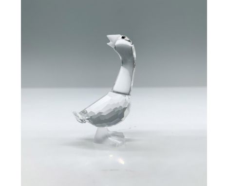 This goose stand tall looking back, is made with black eyes in a facetted clear crystal design with his beak and feet frosted
