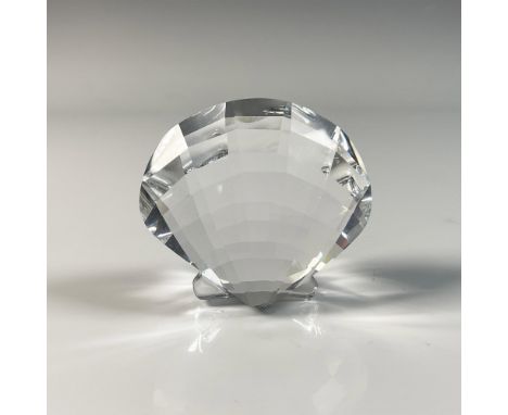 Beautiful figure featuring scallop shell with crafted from clear crystal with intricate cut design. Swarovski swan mark. This