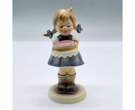 Figure of a girl with pig tails holding a cake. Exclusive Edition 1993/94 M.I Hummel Club. This item has its original box mea
