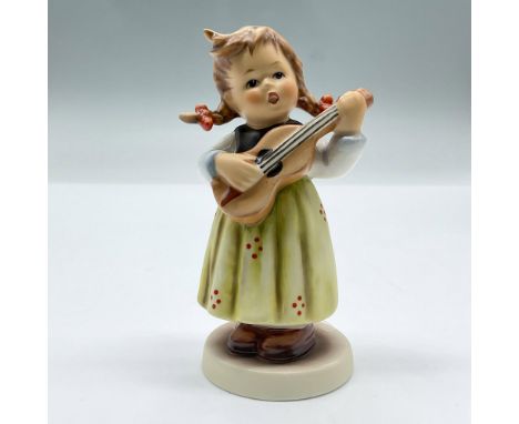 Figure of a girl playing a guitar. Exclusive Edition 1995/96 M.I Hummel Club. This item has its original box measuring 5.75"L
