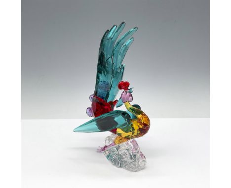 An Asian-inspired design, this tutelary spirit shimmers in a variety of sumptuous crystal colors such as Siam, Medium Topaz, 
