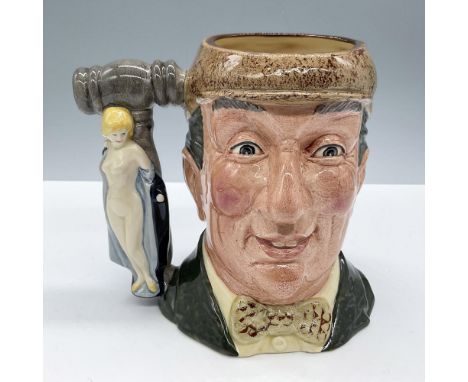 Green coat and bow tie, light brown cap. Royal Doulton backstamp. Artist: Geoff BlowerIssued: 1988Dimensions: 6.25''L x 5.25'