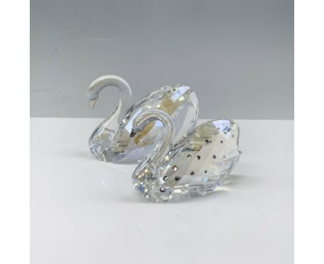 Fabulous crystal duo of figures that includes a swan with its wings lifted up behind them, and a swan with beaded decor. Swar
