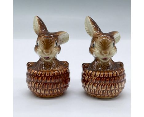Features cute bunnies in a basket. Goebel sticker. Issued: 20th centuryDimensions: 2"L x 1.5"W x 2.75"HManufacturer: Goebel H