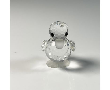 Adorable duck figure with frost silver accent on the beak and feet, crafted from clear crystal. Swarovski swan mark. This ite