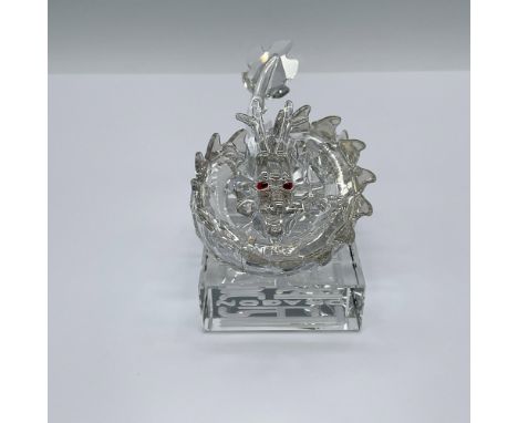 Associated with power, good fortune, and luck, the dragon is stunningly crafted in Silver Shade crystal with Light Siam cryst