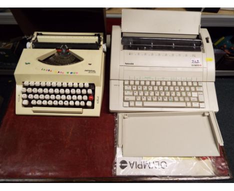Two typewriters, an Imperial 2002 manual typewriter and an Olympia Splendid electric typewriter