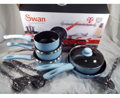 A Swan 9 piece non stick aluminium pan set decorated in a sky blue colour to include 16, 18 & 20 cm saucepans, 24 cm frying p