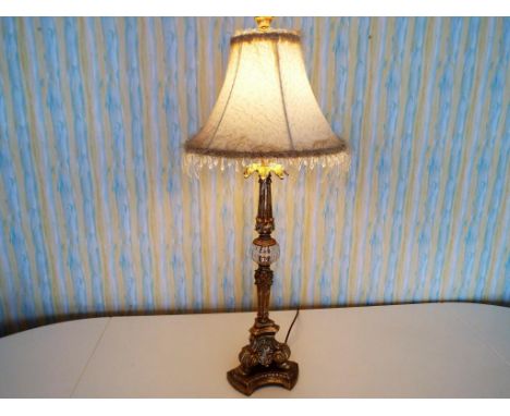 A good quality gilded metal and clear glass table lamp with shade, 95 cm (h)