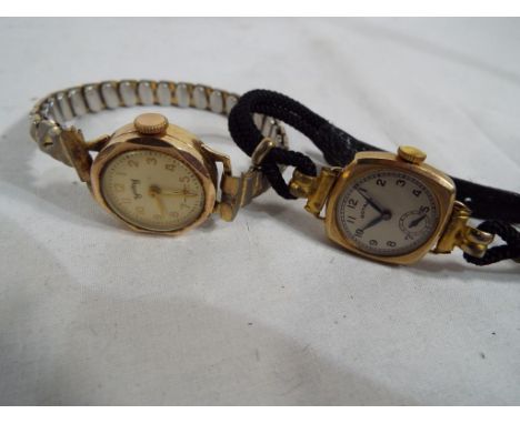 A 9 carat gold cased Rotary wristwatch with black strap and a 9 carat gold cases Services watch with white metal expandable b