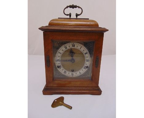 A Garrard mahogany cased chiming bracket clock with silvered dial and Roman numerals, 31 x 22 x 12cm
