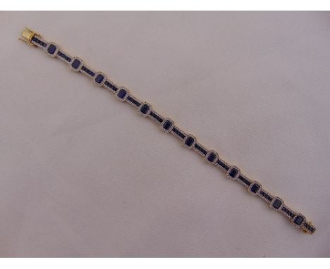 18ct yellow gold, diamond and sapphire articulated bracelet, approx total weight 25.2g