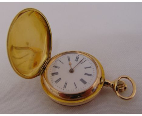 18ct yellow gold ladies pocket watch with white enamel dial and Roman numerals, approx total weight 26.0g