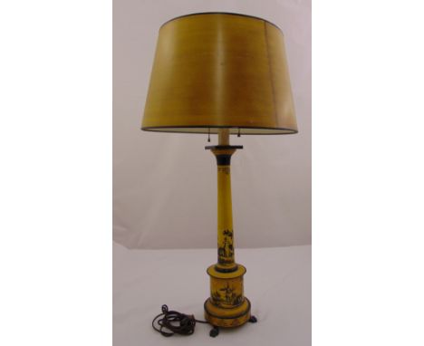 An Italian toile ware yellow lamp base of columnular form on cylindrical base with three paw feet to include matching shade, 