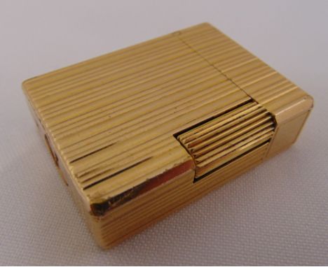 S T Dupont gold plated cigarette lighter