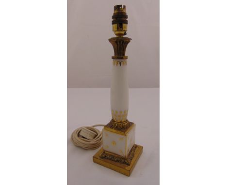 A glass lamp stand of columnular form with gilded decoration on raised square base, 35.5cm (h)