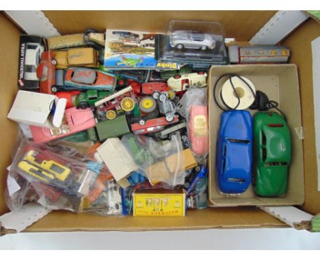 A quantity of play worn Matchbox, Dinky and Chad Valley diecast cars and trucks