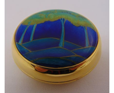 Moorcroft enamel and gilded metal paperweight, signed to the base, 6cm diameter