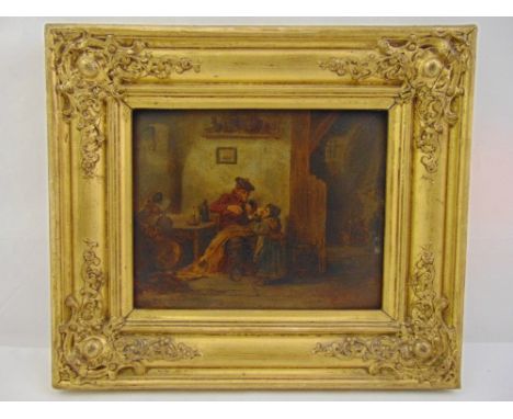 A framed early 19th century oil on board of an interior scene with child lighting the pipe of a seated man wearing a tam o’sh