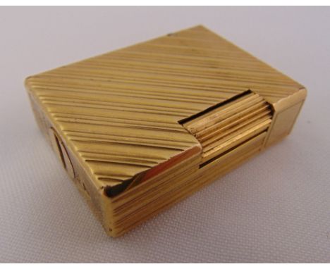 S T Dupont gold plated cigarette lighter