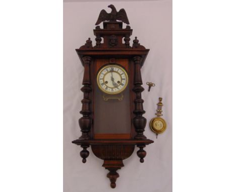 A late 19th century Viennese wall regulator, mahogany case with white enamel dial to include key and pendulum, 85cm (h)
