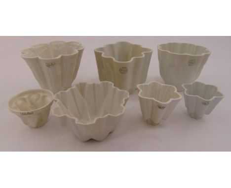 Seven Shelley ceramic jelly moulds of varying shape