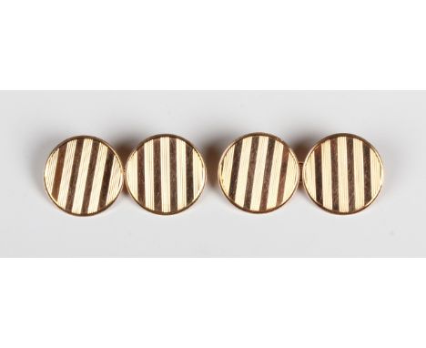 A pair of 9ct gold circular cufflinks with banded decoration, Birmingham 1924, weight 5.9g, diameter of each front 1.5cm.Buye