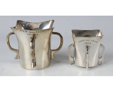 Two Edwardian silver graduated mether cups, each with square shaped rim above four buttress-type handles, London 1903 by Wake