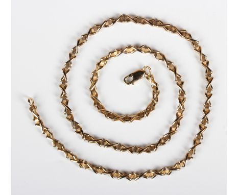 A 9ct gold 'X' link necklace on a sprung hook shaped clasp, detailed '375', weight 12.6g, length 46.8cm, with an associated c