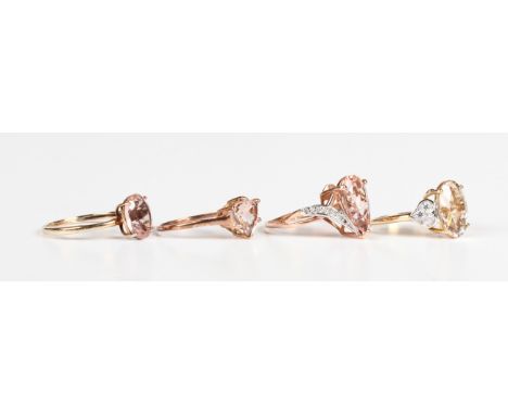 A 9ct rose gold ring, claw set with a pear shaped morganite between diamond set shoulders in a twist design, Birmingham 2012,