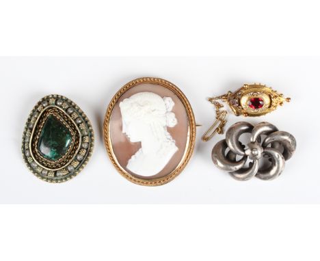 A gold mounted oval shell cameo brooch, 19th century, probably Italian, carved as a portrait of a lady, unmarked, weight 15.9